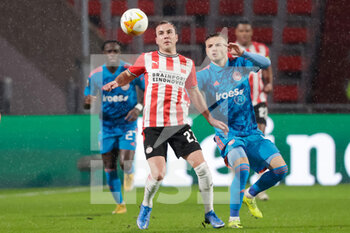 2021-02-25 - Mario Gotze of PSV, Oleg Reabciuk of Olympiacos during the UEFA Europa League, round of 32, 2nd leg football match between PSV and Olympiacos on February 25, 2021 at PSV Stadion in Eindhoven, Netherlands - Photo Perry van de Leuvert / Orange Pictures / DPPI - PSV AND OLYMPIACOS - UEFA EUROPA LEAGUE - SOCCER