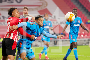 2021-02-25 - Donyell Malen of PSV and Kenny Lala of Olympiacos during the UEFA Europa League, round of 32, 2nd leg football match between PSV and Olympiacos on February 25, 2021 at PSV Stadion in Eindhoven, Netherlands - Photo Perry van de Leuvert / Orange Pictures / DPPI - PSV AND OLYMPIACOS - UEFA EUROPA LEAGUE - SOCCER