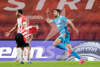 2021-02-25 - Ahmed Hassan of Olympiacos celebrates after scoring his sides first goal during the UEFA Europa League, round of 32, 2nd leg football match between PSV and Olympiacos on February 25, 2021 at PSV Stadion in Eindhoven, Netherlands - Photo Perry van de Leuvert / Orange Pictures / DPPI - PSV AND OLYMPIACOS - UEFA EUROPA LEAGUE - SOCCER