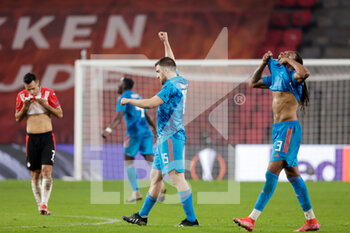 2021-02-25 - Sokratis Papastathopoulos of Olympiacos, Ruben Semedo of Olympiacos celebrate during the UEFA Europa League, round of 32, 2nd leg football match between PSV and Olympiacos on February 25, 2021 at PSV Stadion in Eindhoven, Netherlands - Photo Perry van de Leuvert / Orange Pictures / DPPI - PSV AND OLYMPIACOS - UEFA EUROPA LEAGUE - SOCCER