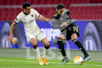 2021-04-08 - Pedro Rodriguez of AS Roma, Devyne Rensch of Ajax during the UEFA Europa League, quarter final, 1st leg football match between Ajax and AS Roma on April 8, 2021 at Johan Cruijff Arena in Amsterdam, Netherlands - Photo Gerrit van Keulen / Orange Pictures / DPPI - AJAX VS AS ROMA - UEFA EUROPA LEAGUE - SOCCER