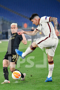 2021-04-15 - Antony of AFC Ajax and Roger Ibanez of AS Roma seen in action during the UEFA Europa League Quarter Finals football match between AS Roma and AFC Ajax at the Olimpic Stadium in Rome. - AS ROMA VS AFC AJAX - UEFA EUROPA LEAGUE - SOCCER
