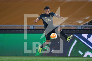 2021-04-15 - David Neres of AFC Ajax seen in action during the UEFA Europa League Quarter Finals football match between AS Roma and AFC Ajax at the Olimpic Stadium in Rome. - AS ROMA VS AFC AJAX - UEFA EUROPA LEAGUE - SOCCER