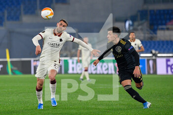 2021-04-15 - Borja Mayoral of AS Roma and Lisandro Martinez of AFC Ajax seen in action during the UEFA Europa League Quarter Finals football match between AS Roma and AFC Ajax at the Olimpic Stadium in Rome. - AS ROMA VS AFC AJAX - UEFA EUROPA LEAGUE - SOCCER