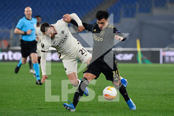 2021-04-15 - Lisandro Martinez of AFC Ajax and Borja Mayoral of AS Roma seen in action during the UEFA Europa League Quarter Finals football match between AS Roma and AFC Ajax at the Olimpic Stadium in Rome. - AS ROMA VS AFC AJAX - UEFA EUROPA LEAGUE - SOCCER