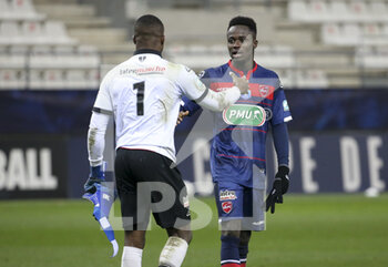 09/02/2021 - Goalkeeper of Valenciennes Hillel Konate and Emmanuel Ntim celebrate the victory following the French Cup, round of 64 football match between Stade de Reims and Valenciennes FC on February 9, 2021 at Auguste Delaune stadium in Reims, France - Photo Jean Catuffe / DPPI - STADE DE REIMS AND VALENCIENNES FC - FRENCH CUP - CALCIO