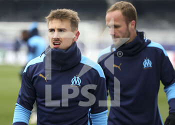 2021-02-10 - Valentin Rongier, Valere Germain of Marseille during the French Cup, round of 64 football match between AJ Auxerre (AJA) and Olympique de Marseille (OM) on February 10, 2021 at Stade Abbe Deschamps in Auxerre, France - Photo Jean Catuffe / DPPI - AJ AUXERRE AND OLYMPIQUE DE MARSEILLE - FRENCH CUP - SOCCER