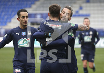 2021-02-10 - Dario Benedetto of Marseille celebrates his goal with Pol Lirola, Saif Eddine Khaoui (left) during the French Cup, round of 64 football match between AJ Auxerre and Olympique de Marseille on February 10, 2021 at Abbe Deschamps stadium in Auxerre, France - Photo Jean Catuffe / DPPI - AJ AUXERRE AND OLYMPIQUE DE MARSEILLE - FRENCH CUP - SOCCER