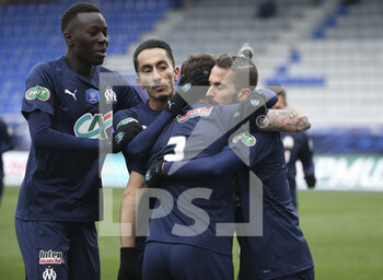 2021-02-10 - Dario Benedetto of Marseille (right) celebrates his goal with from left Pape Gueye, Saif Eddine Khaoui, Pol Lirola during the French Cup, round of 64 football match between AJ Auxerre (AJA) and Olympique de Marseille (OM) on February 10, 2021 at Stade Abbe Deschamps in Auxerre, France - Photo Jean Catuffe / DPPI - AJ AUXERRE AND OLYMPIQUE DE MARSEILLE - FRENCH CUP - SOCCER