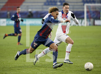 2021-02-10 - Alexis Beka Beka of Caen, Julian Draxler of PSG during the French Cup, round of 64 football match between Stade Malherbe de Caen (SM Caen) and Paris Saint-Germain (PSG) on February 10, 2021 at Stade Michel d'Ornano in Caen, France - Photo Jean Catuffe / DPPI - STADE MALHERBE DE CAEN (SM CAEN) AND PARIS SAINT-GERMAIN (PSG) - FRENCH CUP - SOCCER