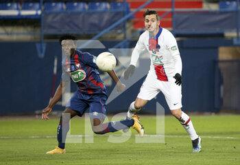 2021-02-10 - Aloys Fouda of Caen, Pablo Sarabia of PSG during the French Cup, round of 64 football match between Stade Malherbe de Caen (SM Caen) and Paris Saint-Germain (PSG) on February 10, 2021 at Stade Michel d'Ornano in Caen, France - Photo Jean Catuffe / DPPI - STADE MALHERBE DE CAEN (SM CAEN) AND PARIS SAINT-GERMAIN (PSG) - FRENCH CUP - SOCCER