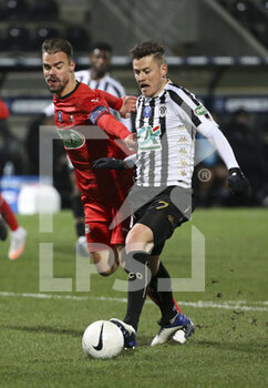 2021-02-11 - Damien Da Silva of Rennes, Pierrick Capelle of Angers during the French Cup, round of 64 football match between SCO Angers and Stade Rennais (Rennes) on February 11, 2021 at Stade Raymond Kopa in Angers, France - Photo Jean Catuffe / DPPI - SCO ANGERS AND STADE RENNAIS (RENNES) - FRENCH CUP - SOCCER