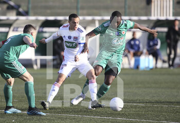 2021-04-08 - Maxence Caqueret of Lyon, Hamadou Karamoko of Red Star during the French Cup round of 16 football match between Red Star FC and Olympique Lyonnais (OL) on April 8, 2021 at Stade Bauer in Saint-Ouen, France - Photo Jean Catuffe / DPPI - RED STAR FC VS OLYMPIQUE LYONNAIS (OL) - FRENCH CUP - SOCCER