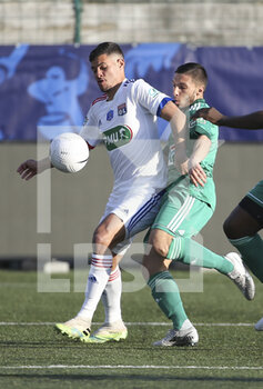 2021-04-08 - Bruno Guimaraes of Lyon, Younes Ghabaoui of Red Star during the French Cup round of 16 football match between Red Star FC and Olympique Lyonnais (OL) on April 8, 2021 at Stade Bauer in Saint-Ouen, France - Photo Jean Catuffe / DPPI - RED STAR FC VS OLYMPIQUE LYONNAIS (OL) - FRENCH CUP - SOCCER