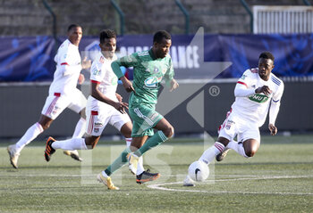 2021-04-08 - Pape Meissa Ba of Red Star between Thiago Mendes and Sinaly Diomande of Lyon during the French Cup round of 16 football match between Red Star FC and Olympique Lyonnais (OL) on April 8, 2021 at Stade Bauer in Saint-Ouen, France - Photo Jean Catuffe / DPPI - RED STAR FC VS OLYMPIQUE LYONNAIS (OL) - FRENCH CUP - SOCCER