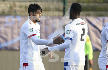 2021-04-08 - Lucas Paqueta of Lyon celebrates his goal with Sinaly Diomande during the French Cup round of 16 football match between Red Star FC and Olympique Lyonnais (OL) on April 8, 2021 at Stade Bauer in Saint-Ouen, France - Photo Jean Catuffe / DPPI - RED STAR FC VS OLYMPIQUE LYONNAIS (OL) - FRENCH CUP - SOCCER