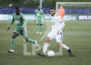 2021-04-08 - Rayan Cherki of Lyon, Baye Mayoro Ndoye of Red Star (left) during the French Cup round of 16 football match between Red Star FC and Olympique Lyonnais (OL) on April 8, 2021 at Stade Bauer in Saint-Ouen, France - Photo Jean Catuffe / DPPI - RED STAR FC VS OLYMPIQUE LYONNAIS (OL) - FRENCH CUP - SOCCER