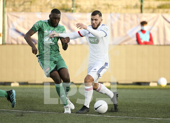 2021-04-08 - Rayan Cherki of Lyon, Hamadou Karamoko of Red Star (left) during the French Cup round of 16 football match between Red Star FC and Olympique Lyonnais (OL) on April 8, 2021 at Stade Bauer in Saint-Ouen, France - Photo Jean Catuffe / DPPI - RED STAR FC VS OLYMPIQUE LYONNAIS (OL) - FRENCH CUP - SOCCER