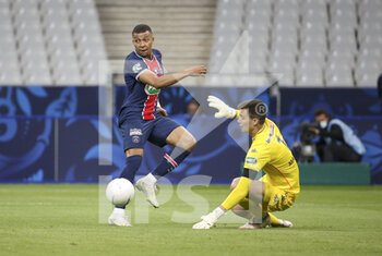 2021-05-19 - Kylian Mbappe of PSG, goalkeeper of Monaco Radoslaw Majecki during the French Cup Final football match between AS Monaco (ASM) and Paris Saint-Germain PSG on May 19, 2021 at Stade de France in Saint-Denis near Paris, France - Photo Jean Catuffe / DPPI - FINAL - AS MONACO (ASM) VS PARIS SAINT-GERMAIN PSG - FRENCH CUP - SOCCER