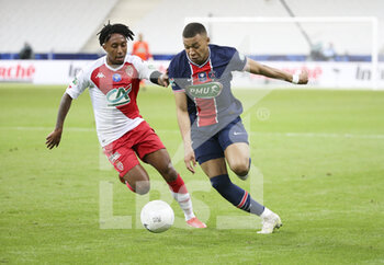 2021-05-19 - Kylian Mbappe of PSG, Gelson Martins of Monaco (left) during the French Cup Final football match between AS Monaco (ASM) and Paris Saint-Germain PSG on May 19, 2021 at Stade de France in Saint-Denis near Paris, France - Photo Jean Catuffe / DPPI - FINAL - AS MONACO (ASM) VS PARIS SAINT-GERMAIN PSG - FRENCH CUP - SOCCER