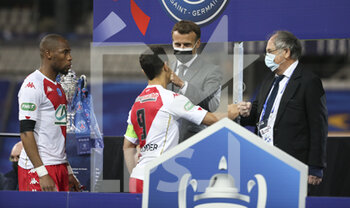 19/05/2021 - President of France Emmanuel Macron salutes Wissam Ben Yedder, Djibril Sidibe (left) of Monaco while President of French Football Federation FFF Noel Le Graet (right) looks on during the trophy ceremony following the French Cup Final football match between AS Monaco (ASM) and Paris Saint-Germain PSG on May 19, 2021 at Stade de France in Saint-Denis near Paris, France - Photo Jean Catuffe / DPPI - FINAL - AS MONACO (ASM) VS PARIS SAINT-GERMAIN PSG - FRENCH CUP - CALCIO