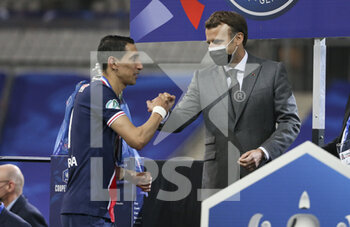2021-05-19 - President of France Emmanuel Macron salutes Angel Di Maria of PSG during the trophy ceremony following the French Cup Final football match between AS Monaco (ASM) and Paris Saint-Germain PSG on May 19, 2021 at Stade de France in Saint-Denis near Paris, France - Photo Jean Catuffe / DPPI - FINAL - AS MONACO (ASM) VS PARIS SAINT-GERMAIN PSG - FRENCH CUP - SOCCER
