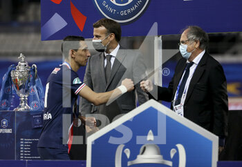 2021-05-19 - From left, Angel Di Maria of PSG, President of France Emmanuel Macron, President of French Football Federation FFF Noel Le Graet during the trophy ceremony following the French Cup Final football match between AS Monaco (ASM) and Paris Saint-Germain PSG on May 19, 2021 at Stade de France in Saint-Denis near Paris, France - Photo Jean Catuffe / DPPI - FINAL - AS MONACO (ASM) VS PARIS SAINT-GERMAIN PSG - FRENCH CUP - SOCCER