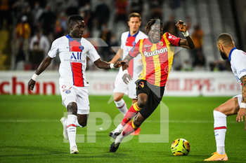 2020-09-10 - Idrissa GUEYE of PSG and Issiaga SYLLA of Lens during the French championship Ligue 1 football match between RC Lens and Paris Saint-Germain on September 10, 2020 at Bollaert stadium in Lens, France - Photo Matthieu Mirville / DPPI - RC LENS (RACING CLUB DE LENS) VS PARIS SAINT-GERMAIN (PSG) - FRENCH LIGUE 1 - SOCCER
