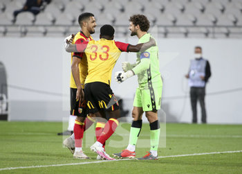 2020-09-10 - Goalkeeper of Lens Jean-Louis Leca (right) celebrates with Facundo Medina and Ismael Boura of Lens the victory following the French championship Ligue 1 football match between RC Lens (Racing Club de Lens) and Paris Saint-Germain (PSG) on September 10, 2020 at Stade Felix Bollaert in Lens, France - Photo Juan Soliz / DPPI - RC LENS (RACING CLUB DE LENS) VS PARIS SAINT-GERMAIN (PSG) - FRENCH LIGUE 1 - SOCCER
