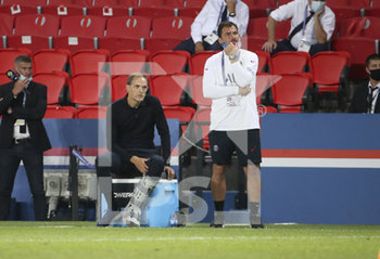 2020-09-16 - Coach of PSG Thomas Tuchel and his assistant coach Arno Michels during the French championship Ligue 1 football match between Paris Saint-Germain (PSG) and FC Metz on September 16, 2020 at Parc des Princes stadium in Paris, France - Photo Juan Soliz / DPPI - PARIS SAINT-GERMAIN (PSG) VS FC METZ - FRENCH LIGUE 1 - SOCCER