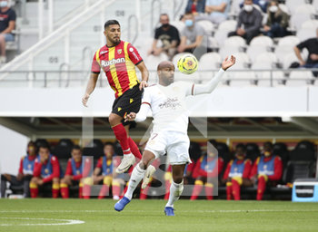 2020-09-19 - Jimmy Briand of Bordeaux, Facundo Medina of Lens (left) during the French championship Ligue 1 football match between RC Lens and Girondins de Bordeaux on September 19, 2020 at Stade Bollaert-Delelis in Lens, France - Photo Juan Soliz / DPPI - RC LENS VS GIRONDINS DE BORDEAUX  - FRENCH LIGUE 1 - SOCCER