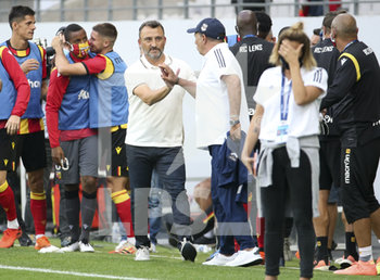 2020-09-19 - Coach of RC Lens Franck Haise greets coach of Girondins de Bordeaux Jean-Louis Gasset following the French championship Ligue 1 football match between RC Lens and Girondins de Bordeaux on September 19, 2020 at Stade Bollaert-Delelis in Lens, France - Photo Juan Soliz / DPPI - RC LENS VS GIRONDINS DE BORDEAUX  - FRENCH LIGUE 1 - SOCCER