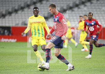 2020-09-25 - Sven Botman of Lille, Randal Kolo Muani of FC Nantes during the French championship Ligue 1 football match between Lille OSC (LOSC) and FC Nantes on September 25, 2020 at Stade Pierre Mauroy in Villeneuve-d'Ascq near Lille, France - Photo Juan Soliz / DPPI - LILLE OSC AND FC NANTES - FRENCH LIGUE 1 - SOCCER