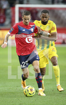 2020-09-25 - Domagoj Bradaric of Lille, Marcus Coco of FC Nantes during the French championship Ligue 1 football match between Lille OSC (LOSC) and FC Nantes on September 25, 2020 at Stade Pierre Mauroy in Villeneuve-d'Ascq near Lille, France - Photo Juan Soliz / DPPI - LILLE OSC AND FC NANTES - FRENCH LIGUE 1 - SOCCER