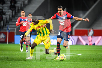 2020-09-25 - Randal KOLO MUANI of FC Nantes and Jose FONTE of Lille during the French championship Ligue 1 football match between Lille OSC and FC Nantes on September 25, 2020 at Pierre Mauroy stadium in Villeneuve-d'Ascq near Lille, France - Photo Matthieu Mirville / DPPI - LILLE OSC AND FC NANTES - FRENCH LIGUE 1 - SOCCER