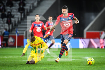 2020-09-25 - Randal KOLO MUANI of FC Nantes and Jose FONTE of Lille during the French championship Ligue 1 football match between Lille OSC and FC Nantes on September 25, 2020 at Pierre Mauroy stadium in Villeneuve-d'Ascq near Lille, France - Photo Matthieu Mirville / DPPI - LILLE OSC AND FC NANTES - FRENCH LIGUE 1 - SOCCER