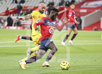2020-09-25 - Jonathan Bamba of Lille, Nicolas Pallois of FC Nantes during the French championship Ligue 1 football match between Lille OSC (LOSC) and FC Nantes on September 25, 2020 at Stade Pierre Mauroy in Villeneuve-d'Ascq near Lille, France - Photo Juan Soliz / DPPI - LILLE OSC AND FC NANTES - FRENCH LIGUE 1 - SOCCER