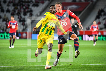 2020-09-25 - Randal KOLO MUANI of FC Nantes and Sven BOTMAN of Lille during the French championship Ligue 1 football match between Lille OSC and FC Nantes on September 25, 2020 at Pierre Mauroy stadium in Villeneuve-d'Ascq near Lille, France - Photo Matthieu Mirville / DPPI - LILLE OSC AND FC NANTES - FRENCH LIGUE 1 - SOCCER