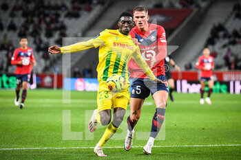 2020-09-25 - Randal KOLO MUANI of FC Nantes and Sven BOTMAN of Lille during the French championship Ligue 1 football match between Lille OSC and FC Nantes on September 25, 2020 at Pierre Mauroy stadium in Villeneuve-d'Ascq near Lille, France - Photo Matthieu Mirville / DPPI - LILLE OSC AND FC NANTES - FRENCH LIGUE 1 - SOCCER