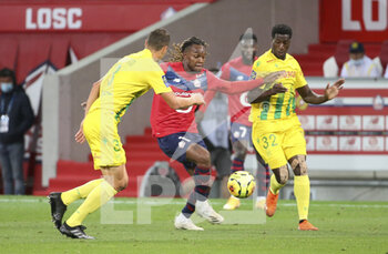 2020-09-25 - Renato Sanches of Lille, Abdoul Kader Bamba of FC Nantes during the French championship Ligue 1 football match between Lille OSC (LOSC) and FC Nantes on September 25, 2020 at Stade Pierre Mauroy in Villeneuve-d'Ascq near Lille, France - Photo Juan Soliz / DPPI - LILLE OSC AND FC NANTES - FRENCH LIGUE 1 - SOCCER