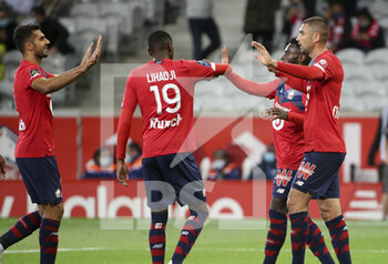 2020-09-25 - Burak Yilmaz of Lille (right) celebrates his goal with teammates during the French championship Ligue 1 football match between Lille OSC (LOSC) and FC Nantes on September 25, 2020 at Stade Pierre Mauroy in Villeneuve-d'Ascq near Lille, France - Photo Juan Soliz / DPPI - LILLE OSC AND FC NANTES - FRENCH LIGUE 1 - SOCCER