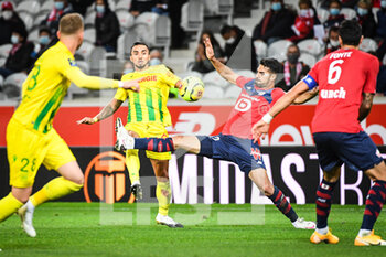 2020-09-25 - Fabio of FC Nantes and Zeki CELIK of Lille during the French championship Ligue 1 football match between Lille OSC and FC Nantes on September 25, 2020 at Pierre Mauroy stadium in Villeneuve-d'Ascq near Lille, France - Photo Matthieu Mirville / DPPI - LILLE OSC AND FC NANTES - FRENCH LIGUE 1 - SOCCER