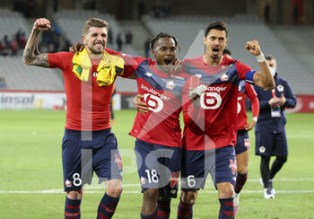 2020-09-25 - Xeka, Renato Sanches, Jose Fonte of Lille celebrate the victory following the French championship Ligue 1 football match between Lille OSC (LOSC) and FC Nantes on September 25, 2020 at Stade Pierre Mauroy in Villeneuve-d'Ascq near Lille, France - Photo Juan Soliz / DPPI - LILLE OSC AND FC NANTES - FRENCH LIGUE 1 - SOCCER