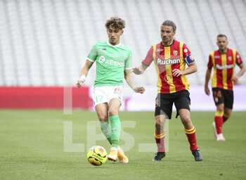 2020-10-03 - Adil Aouchiche of Saint-Etienne, Yannick Cahuzac of Lens during the French championship Ligue 1 football match between RC Lens and AS Saint Etienne (ASSE) on October 3, 2020 at Stade Bollaert-Delelis formerly Stade Felix Bollaert in Lens, France - Photo Jean Catuffe / DPPI - RC LENS VS AS SAINT ETIENNE (ASSE) - FRENCH LIGUE 1 - SOCCER