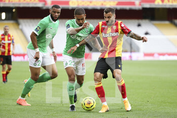 2020-10-03 - Ivann Macon of Saint-Etienne, Jonathan Clauss of Lens during the French championship Ligue 1 football match between RC Lens and AS Saint Etienne (ASSE) on October 3, 2020 at Stade Bollaert-Delelis formerly Stade Felix Bollaert in Lens, France - Photo Jean Catuffe / DPPI - RC LENS VS AS SAINT ETIENNE (ASSE) - FRENCH LIGUE 1 - SOCCER