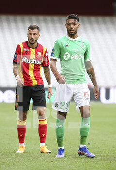 2020-10-03 - Jonathan Clauss of Lens, Denis Bouanga of Saint-Etienne during the French championship Ligue 1 football match between RC Lens and AS Saint Etienne (ASSE) on October 3, 2020 at Stade Bollaert-Delelis formerly Stade Felix Bollaert in Lens, France - Photo Jean Catuffe / DPPI - RC LENS VS AS SAINT ETIENNE (ASSE) - FRENCH LIGUE 1 - SOCCER
