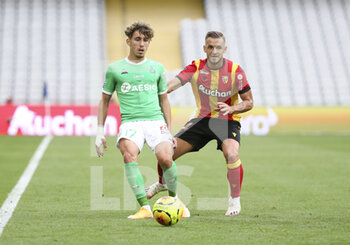 2020-10-03 - Adil Aouchiche of Saint-Etienne, Jonathan Gradit of Lens during the French championship Ligue 1 football match between RC Lens and AS Saint Etienne (ASSE) on October 3, 2020 at Stade Bollaert-Delelis formerly Stade Felix Bollaert in Lens, France - Photo Jean Catuffe / DPPI - RC LENS VS AS SAINT ETIENNE (ASSE) - FRENCH LIGUE 1 - SOCCER