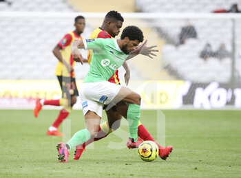 2020-10-03 - Mahdi Camara of Saint-Etienne, Cheick Doucoure of Lens during the French championship Ligue 1 football match between RC Lens and AS Saint Etienne (ASSE) on October 3, 2020 at Stade Bollaert-Delelis formerly Stade Felix Bollaert in Lens, France - Photo Jean Catuffe / DPPI - RC LENS VS AS SAINT ETIENNE (ASSE) - FRENCH LIGUE 1 - SOCCER