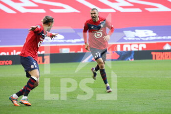 2020-12-06 - Joie Yusuf Yazici 12 and Burak Yilmaz 17 players LOSC after two goal during the French championship Ligue 1 football match between Lille OSC and AS Monaco on December 6, 2020 at Pierre Mauroy stadium in Villeneuve-d'Ascq, France - Photo Laurent Sanson / LS Medianord / DPPI - LILLE OSC VS AS MONACO - FRENCH LIGUE 1 - SOCCER