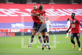 2020-12-06 - Congratulations Yusuf Yazici LOSC 12 two goal ans Burak Yilmaz 17 LOSC during the French championship Ligue 1 football match between Lille OSC and AS Monaco on December 6, 2020 at Pierre Mauroy stadium in Villeneuve-d'Ascq, France - Photo Laurent Sanson / LS Medianord / DPPI - LILLE OSC VS AS MONACO - FRENCH LIGUE 1 - SOCCER